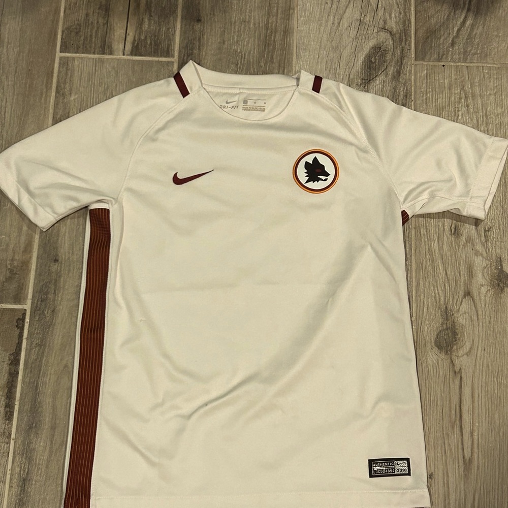 Three soccer jerseys